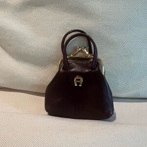 Elegant Brown and Gold Mini coin bag with Structured Design by Aigner burganty